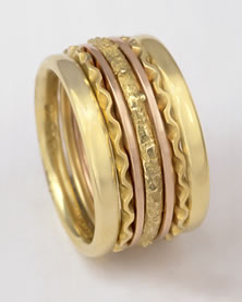 A seven band Stacking Ring in 18K yellow gold